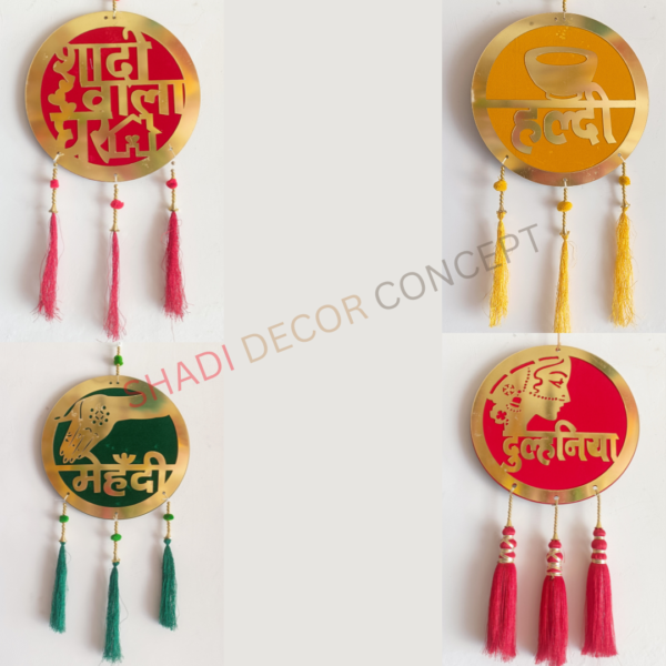 Wedding Decorative Hangings Set Of Shadi Wala Ghar. Haldi / Mehndi Decoration Board Banner for for Marriage/Wedding/Shaadi Home Stage Decoration. This board is suitable for all types of occasions, such as weddings The lightweight and compact design make it easy to take with you wherever you go. Features intricate designs and artworks to give it a unique and elegant look. You Can use this colorful wedding board for wall, door, balcony and decorations outdoor & indoor in your home. Create the best wedding ever with these fun Wedding Door Board signs, Your guests will be blown away by how you thought of every little detail that will create a memorable wedding for everyone. Door Board make great decorations for your home. Fashionable Haldi/Mehandi, Shadi Wala Ghar, Dulhaniya door board are great suitable for Wedding Favor.