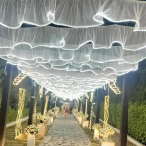The unique S-shaped wave design Wedding Ceiling adds a touch of elegance and romance to the wedding stage, creating a dreamy and romantic atmosphere. This wedding decorative LED ceiling is available in a variety of colors, allowing you to choose the perfect color to match your wedding theme and style.