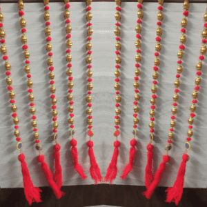 Multi color Pom-poms Handmade strings with golden gotta ball, mirror & tassels Hanging strings/garlands/torans/wall hangings are best choice for decoration ( 3 Feet) Made in India. Beautiful wall hanging Toran for home decoration. It can be used to decorate pooja room, home entrance door, can be hung like Toran in any design. It can be used for decoration of hall, living room or drawing room, balcony and garden also. A beautiful home decor for any function, pooja, marriage ceremony, engagement, or festivals such as diwali, dusshera, Ganesh Chaturthi Wedding Theme Party Props etc. The wall hanging torans are long lasting and can be easily washed and reused. You can hang it anywhere on your doorway, main door, railings, on the sides of mirror etc. It adds the touch of Tradition to the interiors of your house. Length of the strings is 3 Feet.