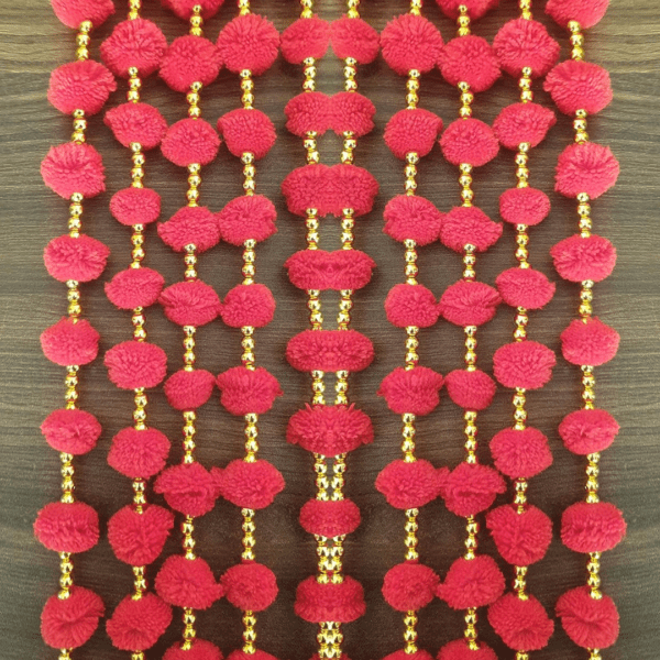 Decorate your home/doors and bring good luck to your home by these Pom Pom Flowers Garlands Torans. Pom Pom can be hanged on doors and can be used on many occasions like Corporate Gifts, Diwali Decorations , Pooja ghar, Festivals, House Warming, Wedding, Parties and inaugurations. Material: Handmade product made up of woolen pom-pom,golden beads, Chakri and golden decorative hanging bells Can be used to create strings. The wall hanging torans are long lasting and can be easily washed and reused. Can be used to create strings' curtains in living area. Looks good as wall hangings, door torans, window backdrops etc.