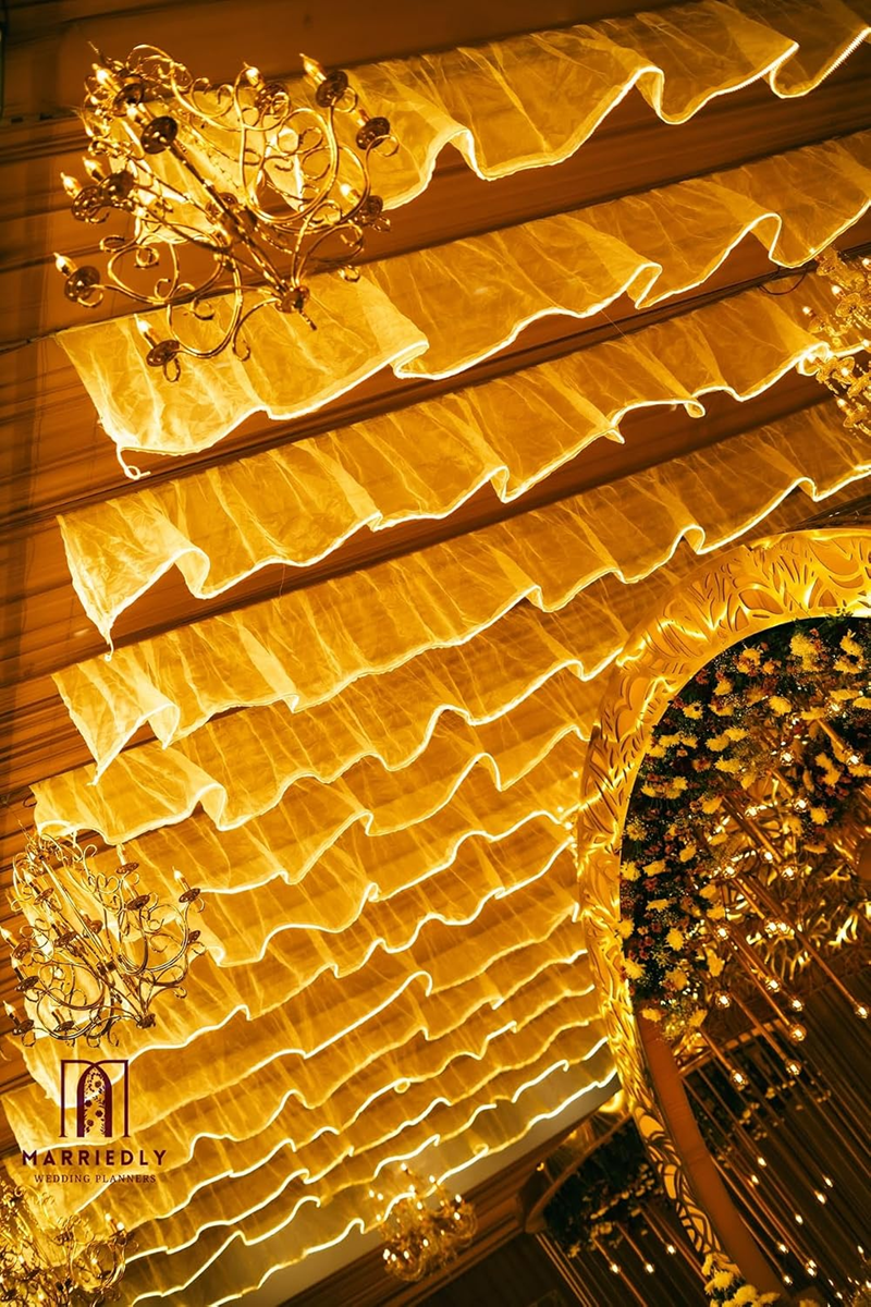 The unique S-shaped wave design Wedding Ceiling adds a touch of elegance and romance to the wedding stage. Creating a dreamy and romantic atmosphere.